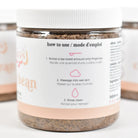Coffee Bean Sugar Scrub usage instructions on jar for exfoliating and cleansing skin.