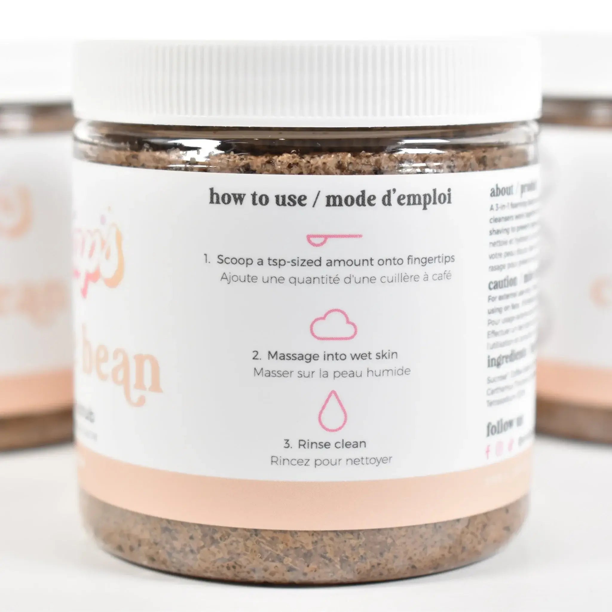 Coffee Bean Sugar Scrub usage instructions on jar for exfoliating and cleansing skin.