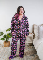 Georgia Rylan women's bamboo long sleeve button-up top and straight-leg pajama pants in Dreamy Blooms black floral print - Cloud Nine Pajamas plus size model