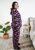 Georgia Rylan women's bamboo long sleeve button-up top and straight-leg pajama pants in Dreamy Blooms black floral print - Cloud Nine Pajamas side profile on plus size model