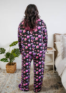 Georgia Rylan women's bamboo long sleeve button-up top and straight-leg pajama pants in Dreamy Blooms black floral print - Cloud Nine Pajamas back view on plus size model