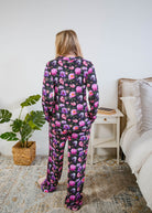 Georgia Rylan women's bamboo long sleeve button-up top and straight-leg pajama pants in Dreamy Blooms black floral print - Cloud Nine Pajamas back view full length