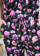 Georgia Rylan women's bamboo flutter sleeve top and soft jogger pajama pants set in Dreamy Blooms black floral print showing close up of print, pockets and drawstring