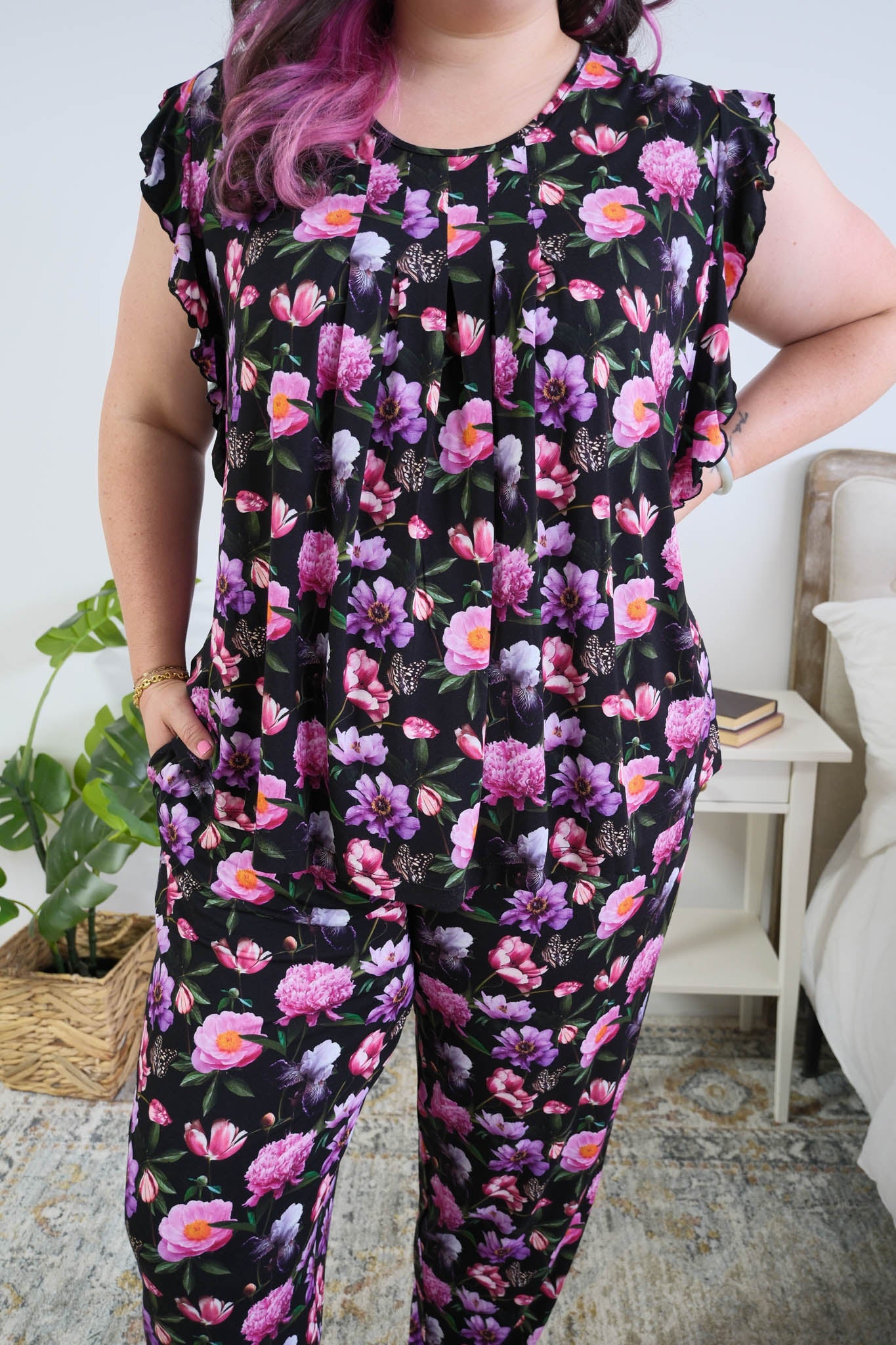 Georgia Rylan women's bamboo flutter sleeve top and soft jogger pajama pants set in Dreamy Blooms black floral print - Cloud Nine Pajamas pleated front detail on plus size model