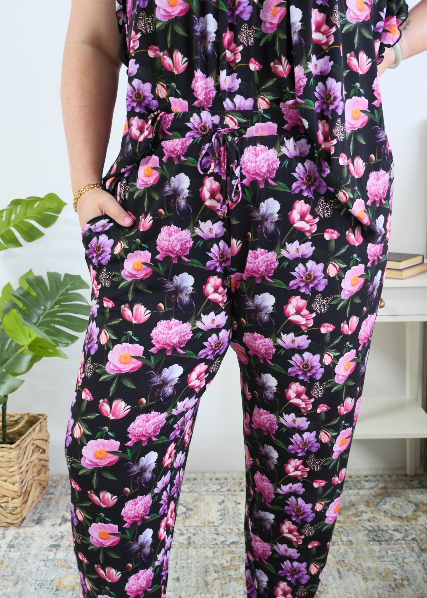 Georgia Rylan women's bamboo flutter sleeve top and soft jogger pajama pants set in Dreamy Blooms black floral print - Cloud Nine Pajamas close up of the print on plus size model