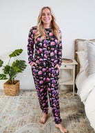 Full length view on model Georgia Rylan women's long sleeve crewneck top and jogger pajama pants set in Dreamy Blooms black floral bamboo Cloud Nine Pajamas