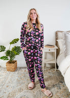 Georgia Rylan women's long sleeve crewneck top and jogger pajama pants set in Dreamy Blooms black floral bamboo Cloud Nine Pajamas shown with the top tucked in and the pockets 