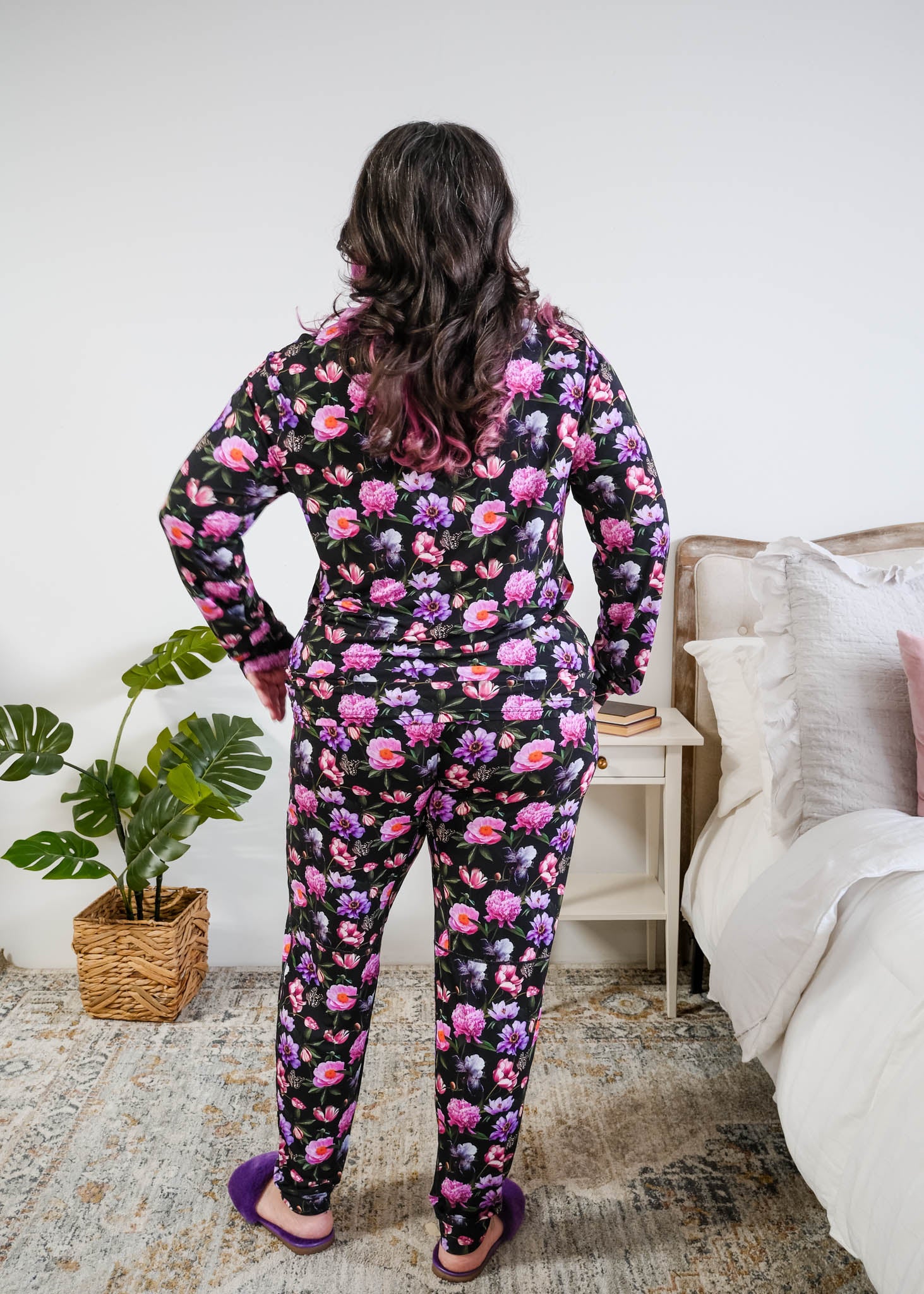 Georgia Rylan women's long sleeve crewneck top and jogger pajama pants set in Dreamy Blooms black floral bamboo Cloud Nine Pajamas back view on plus size model 