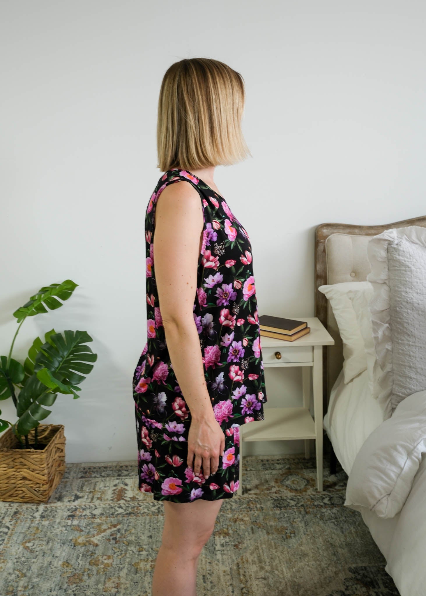 Georgia Rylan women's bamboo tank top and matching pajama shorts set in Dreamy Blooms black floral print - Cloud Nine Pajamas side profile shown on model