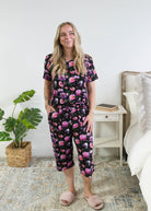 Georgia Rylan women's bamboo rolled-sleeve t-shirt and capri pajama pants in Dreamy Blooms black floral print - Cloud Nine Pajamas full length view on short model
