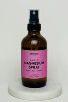 all-groups Lavender Magic Magnesium Spray 4 Oz bottle on marble surface for pain relief, stress reduction, and better sleep.