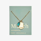 Birthstone Charm Necklace in 14k Plated Gold featuring aquamarine stone and serenity intention for March.