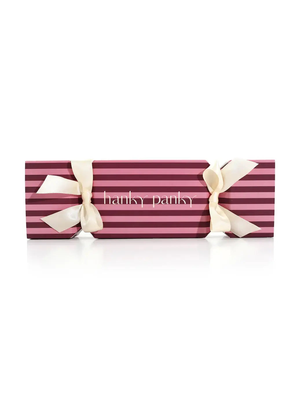 Retro Thong 3-Pack Gift Cracker packaging with pink and purple stripes and beige ribbons by Hanky Panky.