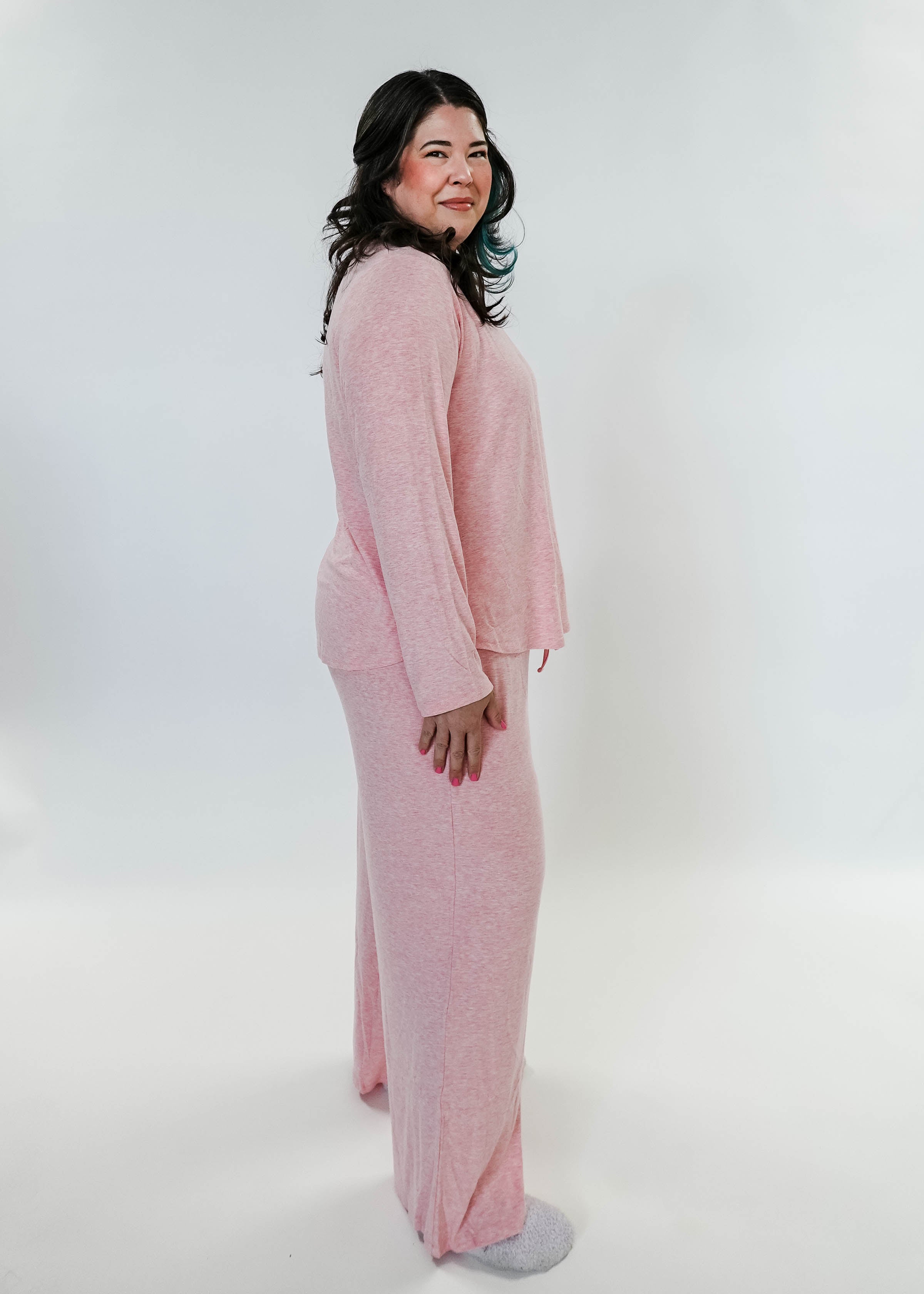 plus size woman standing wearing heather pink lounge set by miranda nic