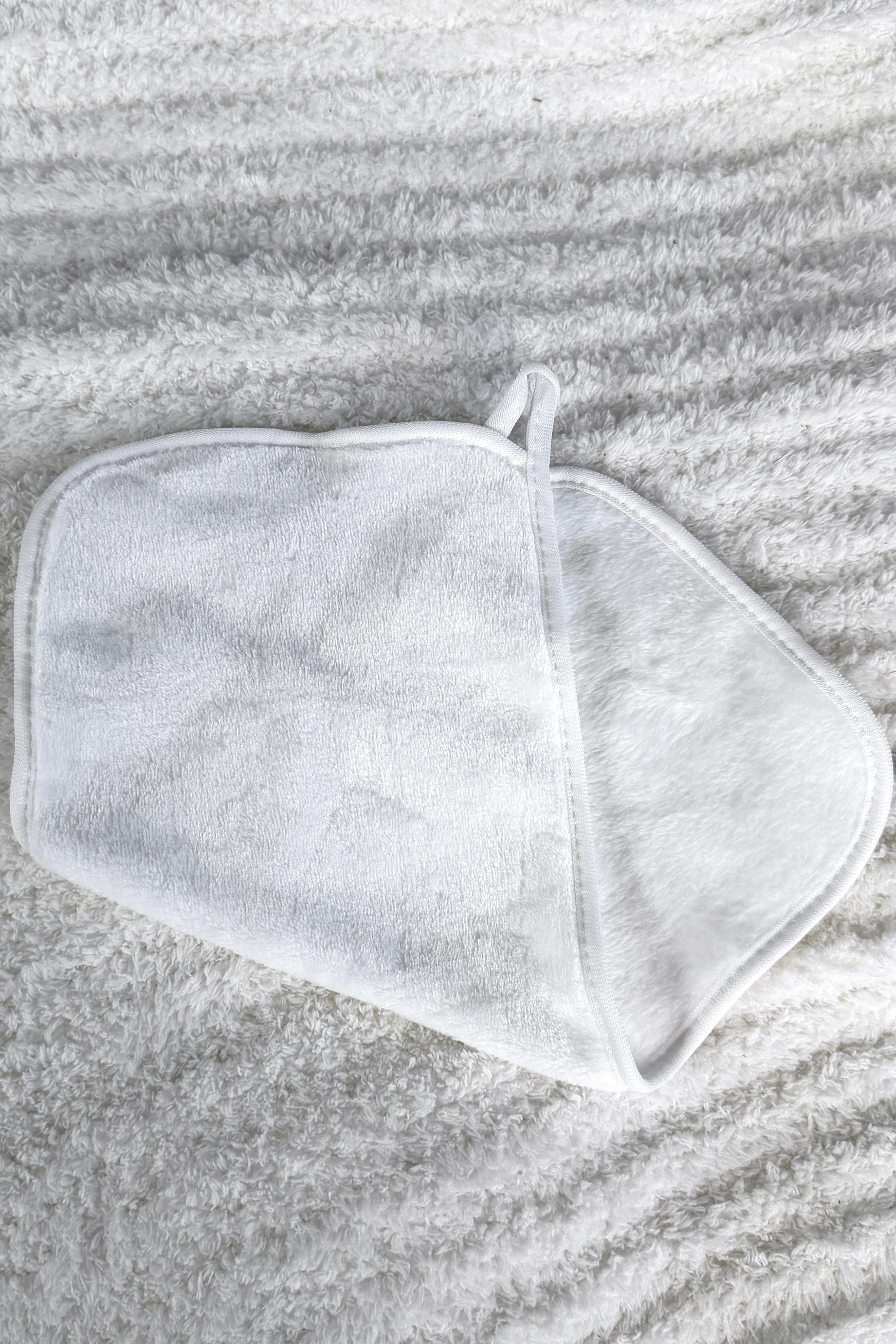 white remove it cloth showing texture of cloth on both sides