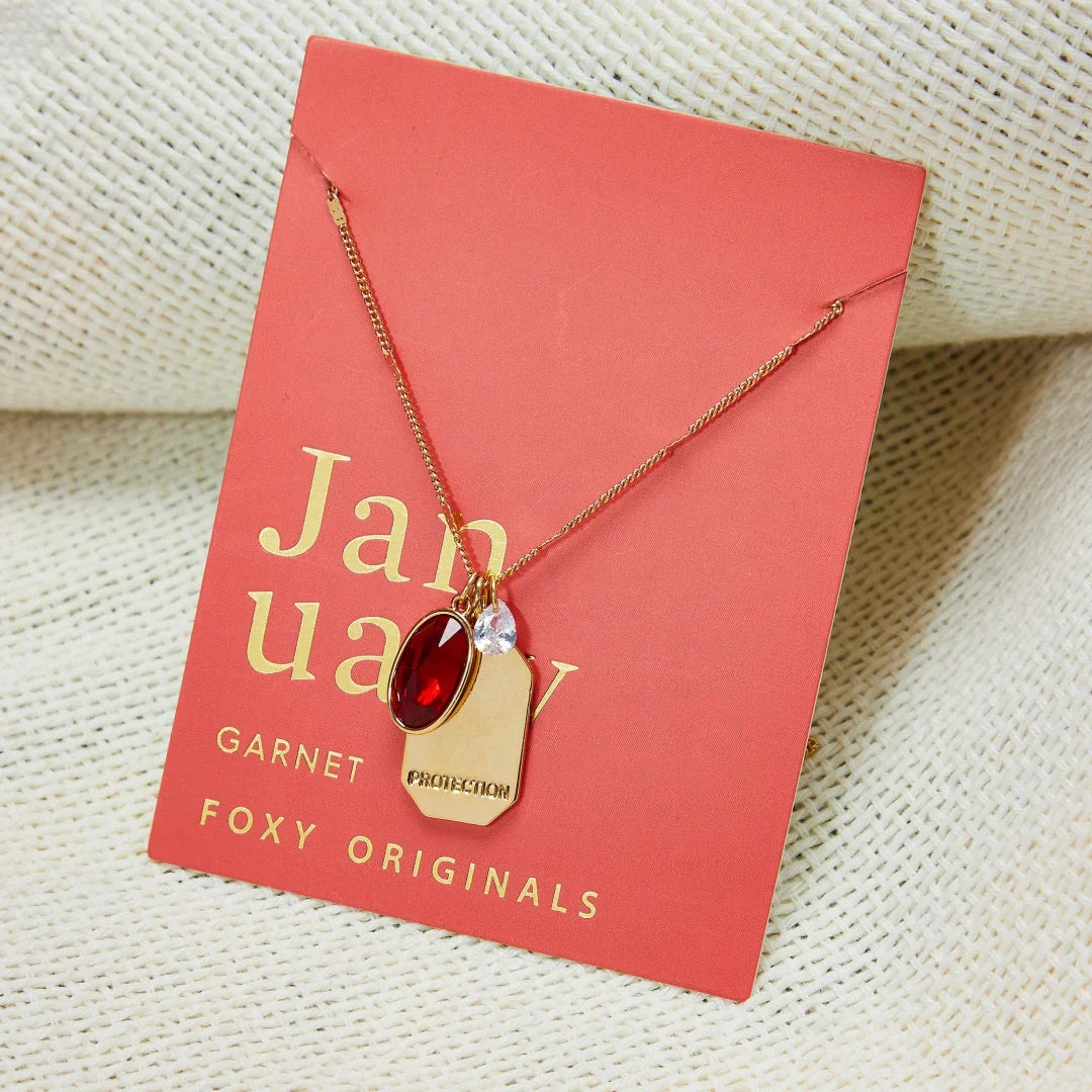 Birthstone Charm Necklace in 14k Plated Gold featuring garnet for January with 'Protection' intention word.