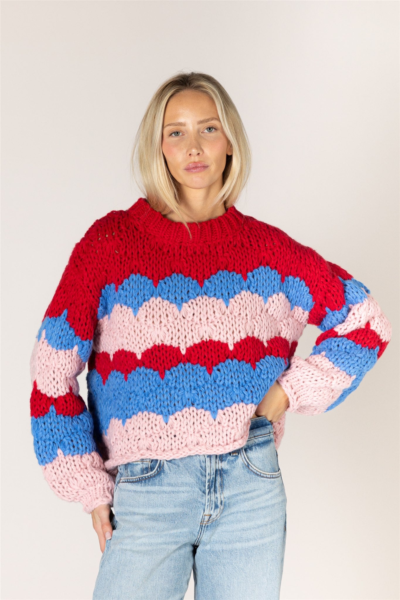 Lyla & Luxe LYNN hand-knit red blue pink chunky stripe crew neck sweater — model wearing Small — Cloud Nine Pajamas Edmonton