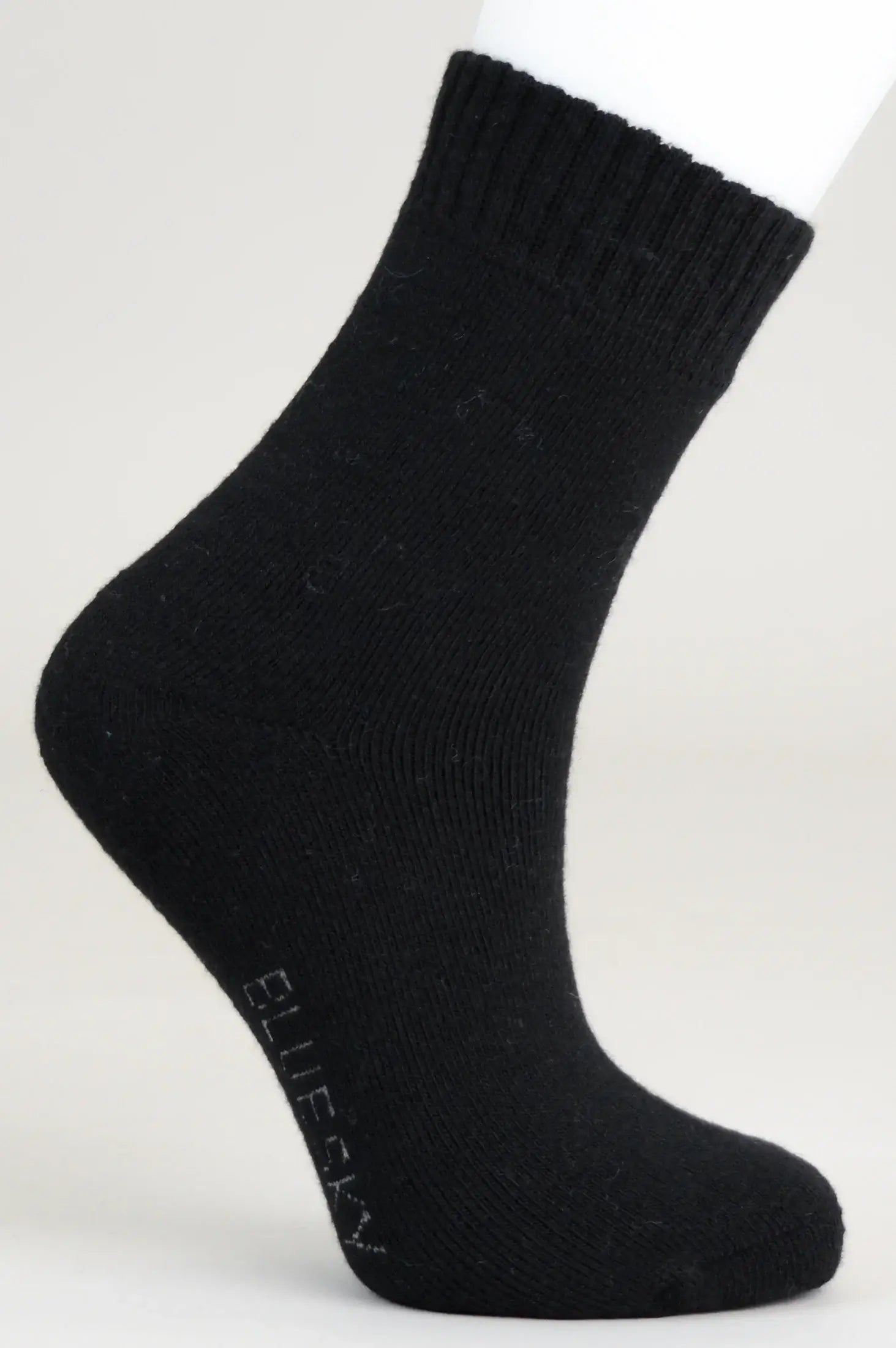 Ladies Merino Wool Socks Blue Sky Clothing Co. side view on white background, showcasing soft and warm fabric.