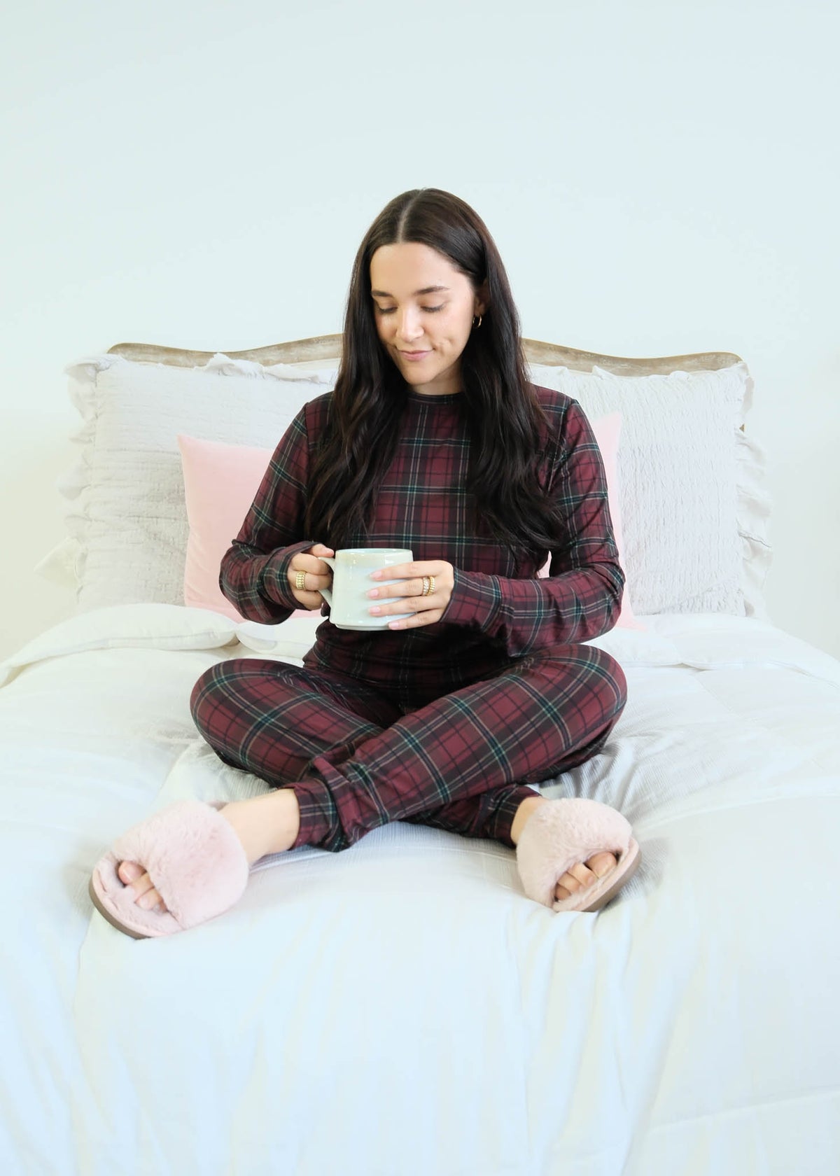 Georgia Rylan Bamboo Plaid PJ Set model seated on bed with mug lifestyle — Cloud Nine Pajamas Edmonton