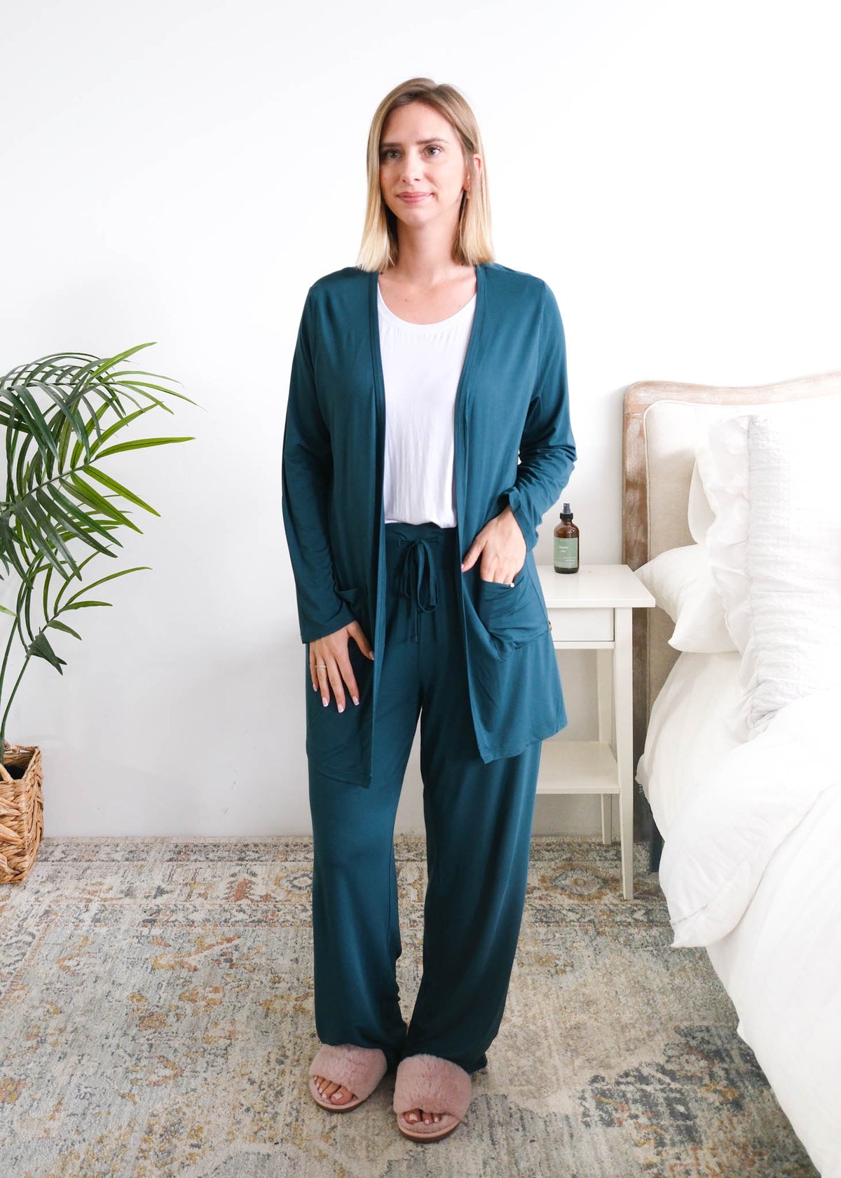 Georgia Rylan Long Bamboo Cardigan with Pockets Midnight Teal front view on model — Cloud Nine Pajamas Edmonton