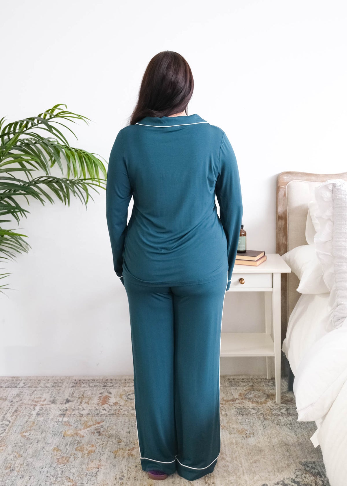 Georgia Rylan Midnight Teal Long Sleeve Bamboo PJ Set model back view — Cloud Nine Pajamas