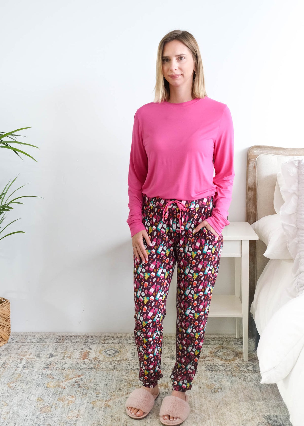Georgia Rylan Wine Tasting Bamboo Jogger Set model full length with shirt tucked in — Cloud Nine Pajamas