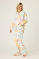 Model wearing Lucky Me Tarot Card Print 3-Piece Flannel PJ Set from PJ Salvage, showcasing cozy and colorful design.
