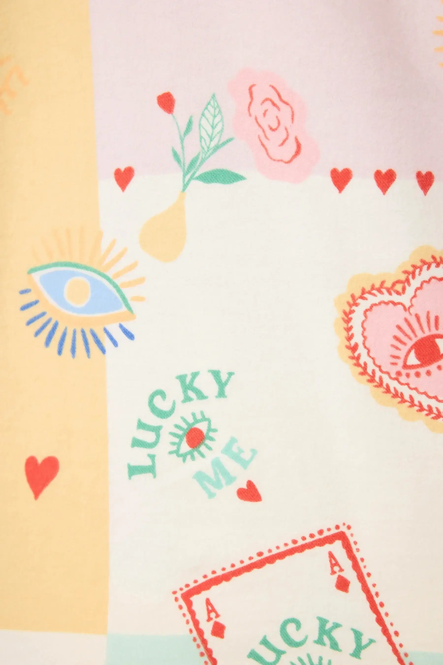 Lucky Me Tarot card print design featuring colorful patterns and symbols on fabric for PJ Salvage flannel PJ set.