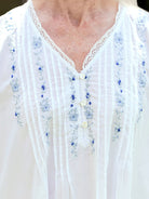April Cornell Cottage Scatter Cotton Nightgown showing close up of the delicate blue floral embroidery