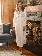  Model (Genevieve, 5'9") wearing the April Cornell Embroidery Sampler Nighty in ecru cotton, showing the long, flowing length and gentle gathers.