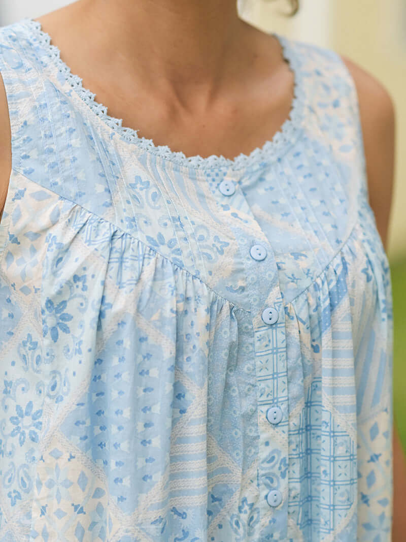 April Cornell Maddie’s Medley Cotton Nightgown – Embroidered Light Blue Sleeveless Nighty with Button Front. Close up showing the light blue button front and pintuck/crochet details. 