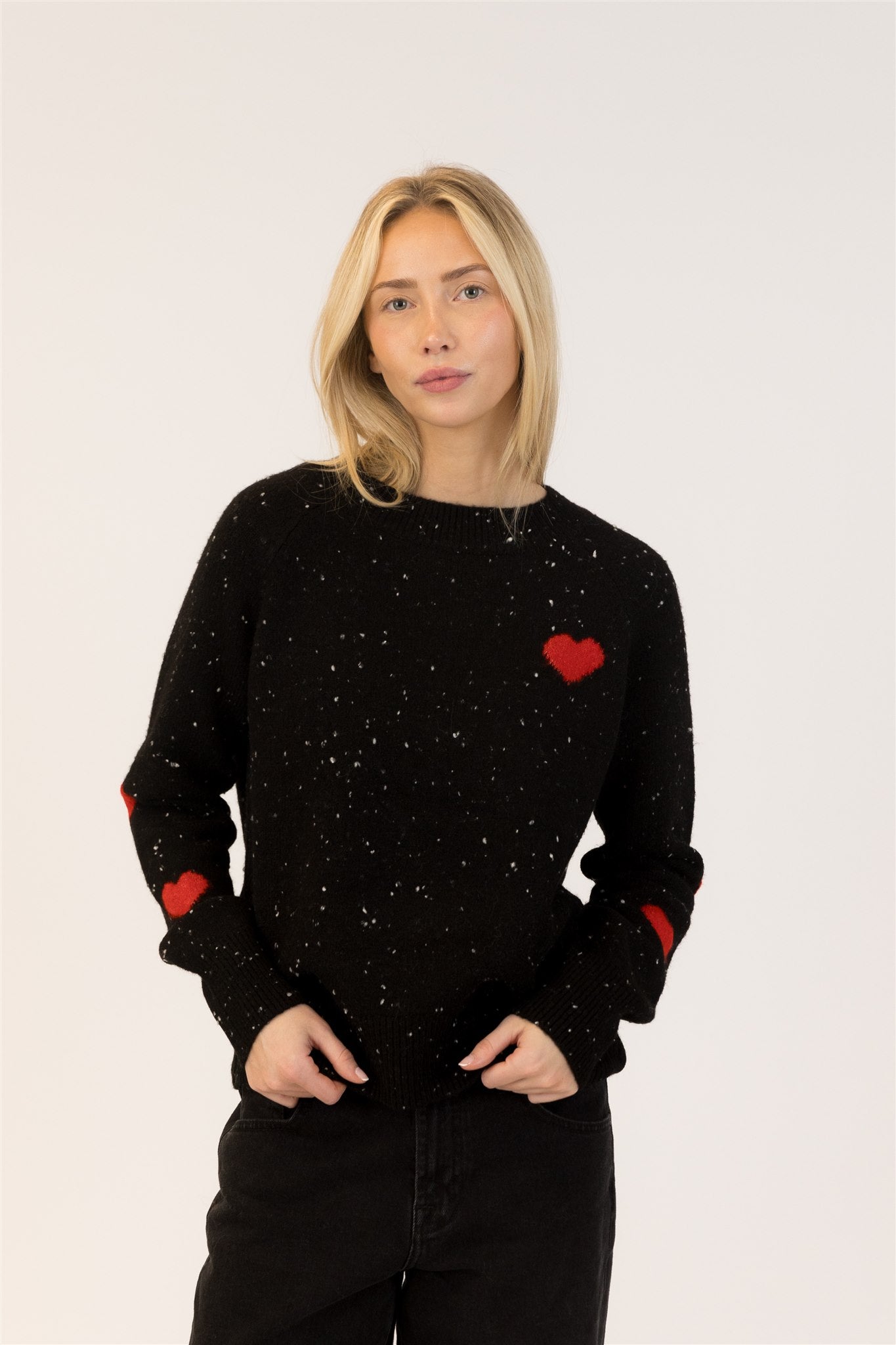 women's fall pullover sweater black with red heart detail lyla + luxe