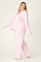 Happy Hour Wine Glass Print 3-Piece PJ Set Plus Size Inclusive model wearing playful pink pajama set with wine glass pattern, side view