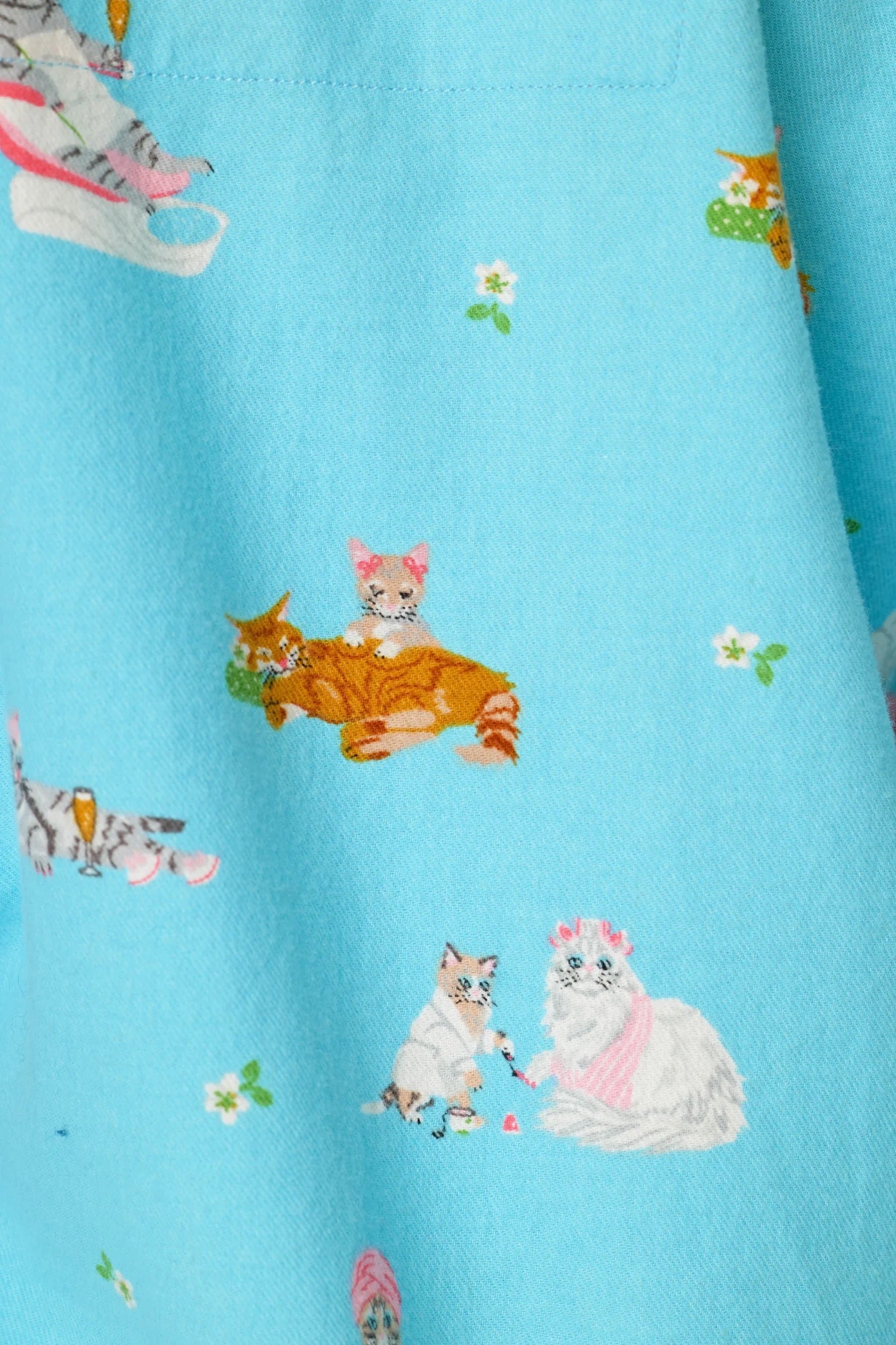 PJ Salvage Paws and Relax Pampered Cats Blue Elixir flannel fabric swatch — Cloud Nine Pajamas Edmonton