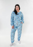 women's dogs on ice skates print velour top and jogger set on blue background - Miranda Nic