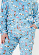 women's dogs on ice skates print velour top and jogger set on blue background - Miranda Nic