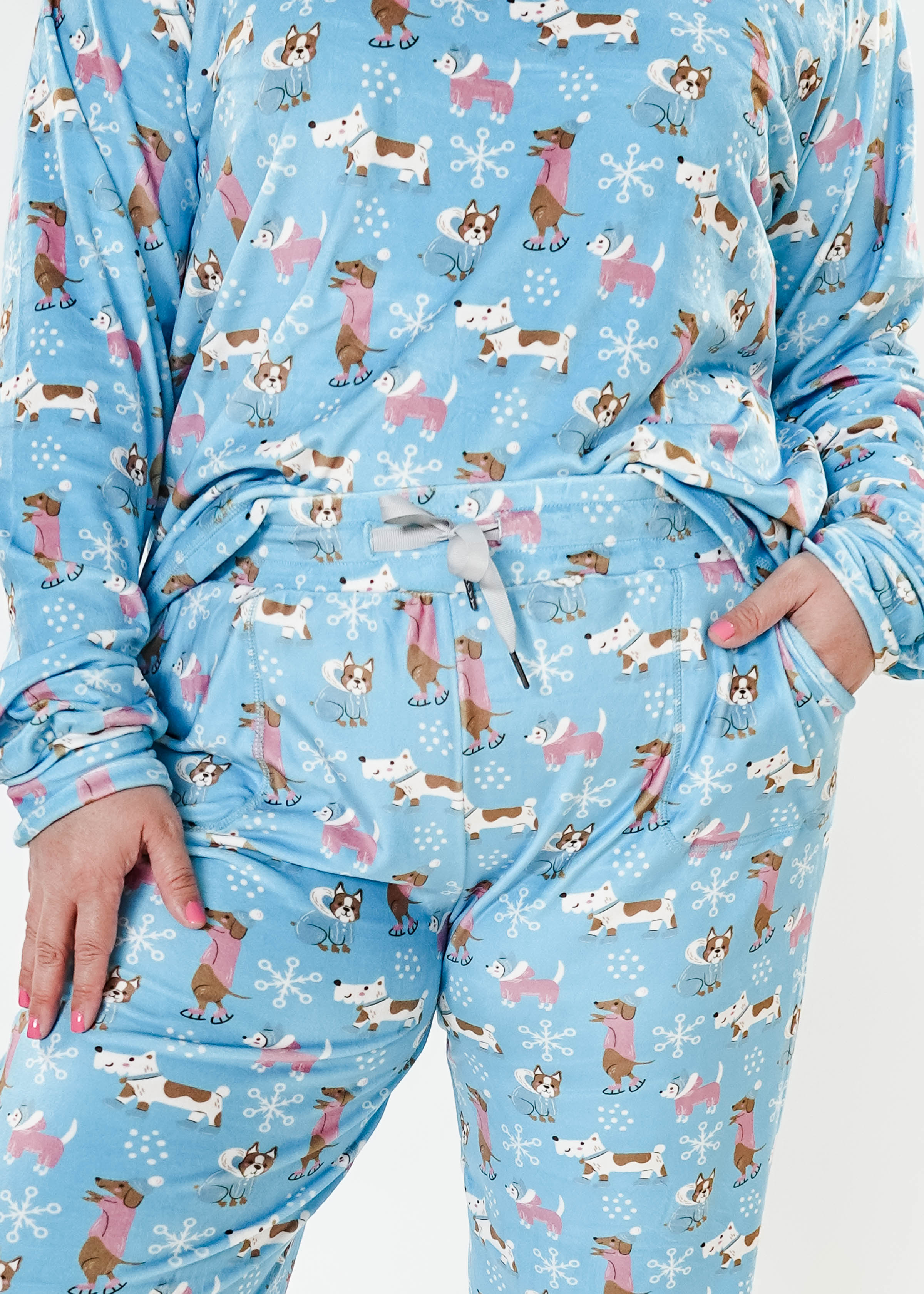 women's dogs on ice skates print velour top and jogger set on blue background - Miranda Nic