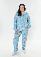 women's dogs on ice skates print velour top and jogger set on blue background - Miranda Nic