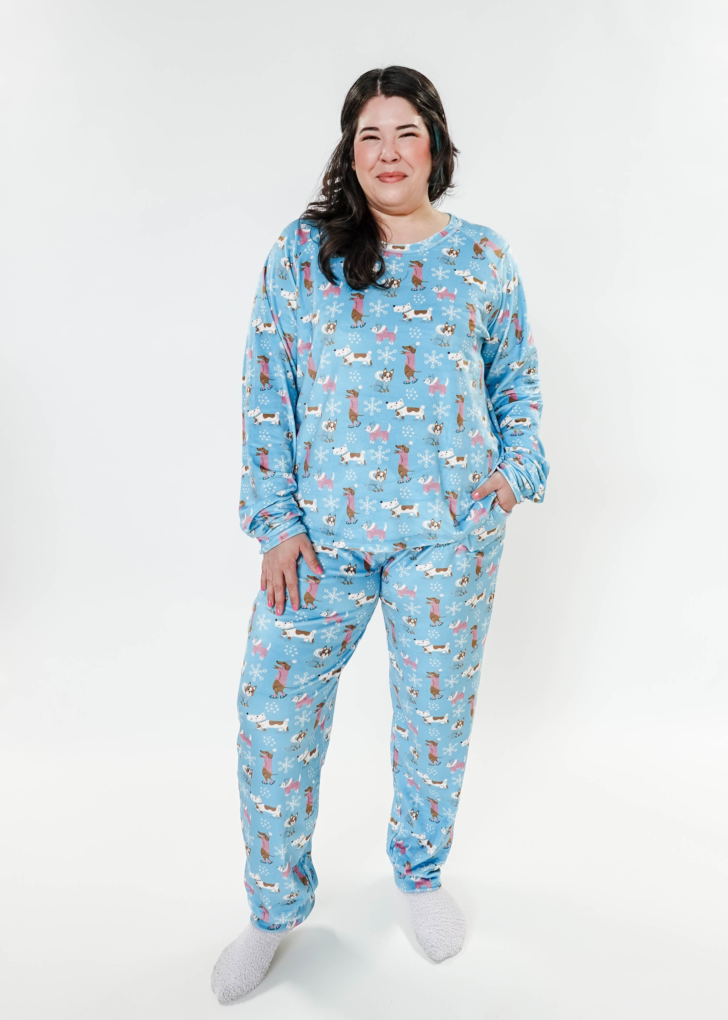 women's dogs on ice skates print velour top and jogger set on blue background - Miranda Nic