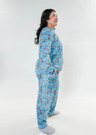 Woman wearing Paws On Ice Long Sleeve Jogger Velour Lounge Set in playful winter-themed design.