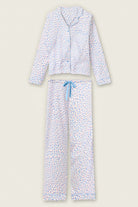 Whimsy Walk On The Wild Side PJ Set featuring a leopard print design in sky-blue and soft-coral colors.