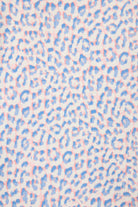 Leopard print pattern featuring pastel sky-blue and soft-coral hues for the Whimsy Walk On The Wild Side PJ Set.