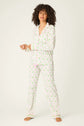 Playful Prints Cotton-Modal Long Sleeve Pajama Set by PJ Salvage displayed on a model with curly hair, in a playful pattern.