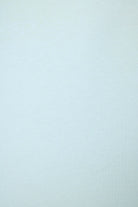 PJ SALVAGE Graphic Print Softee Tee & Short Lounge Set in "Breakfast Club" graphic tee shirt in light blue. Fabric close up of the cotton slub showing the texture and colour of the set