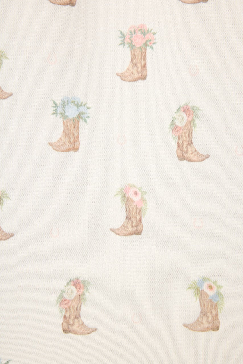 Western Blooms Boot Bouquet pattern featuring floral cowboy boots on an ivory background.