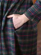 Saratoga Long Flannel Cotton Nightgown in blue plaid, featuring a hand in the pocket for added comfort and style.