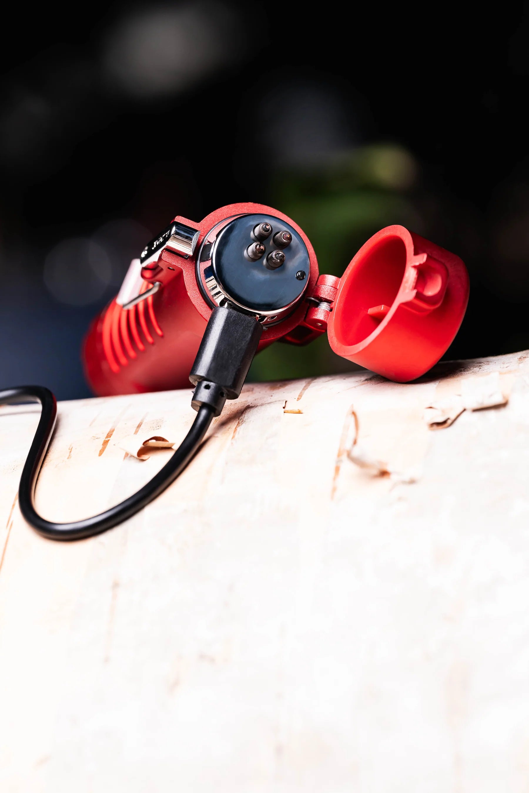Sizzle Survival USB Rechargeable Electric Plasma Lighter & Flashlight showning charging cable and port placement. Photo showing red lighter, available in black - Cloud Nine Pajamas