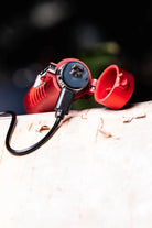 Sizzle Survival USB Rechargeable Electric Plasma Lighter & Flashlight showning charging cable and port placement. Photo showing red lighter, available in black - Cloud Nine Pajamas