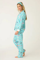 Model wearing This Is How I Roll Dog Print Flannel PJ Set in soft fabric, ideal for cozy game nights.