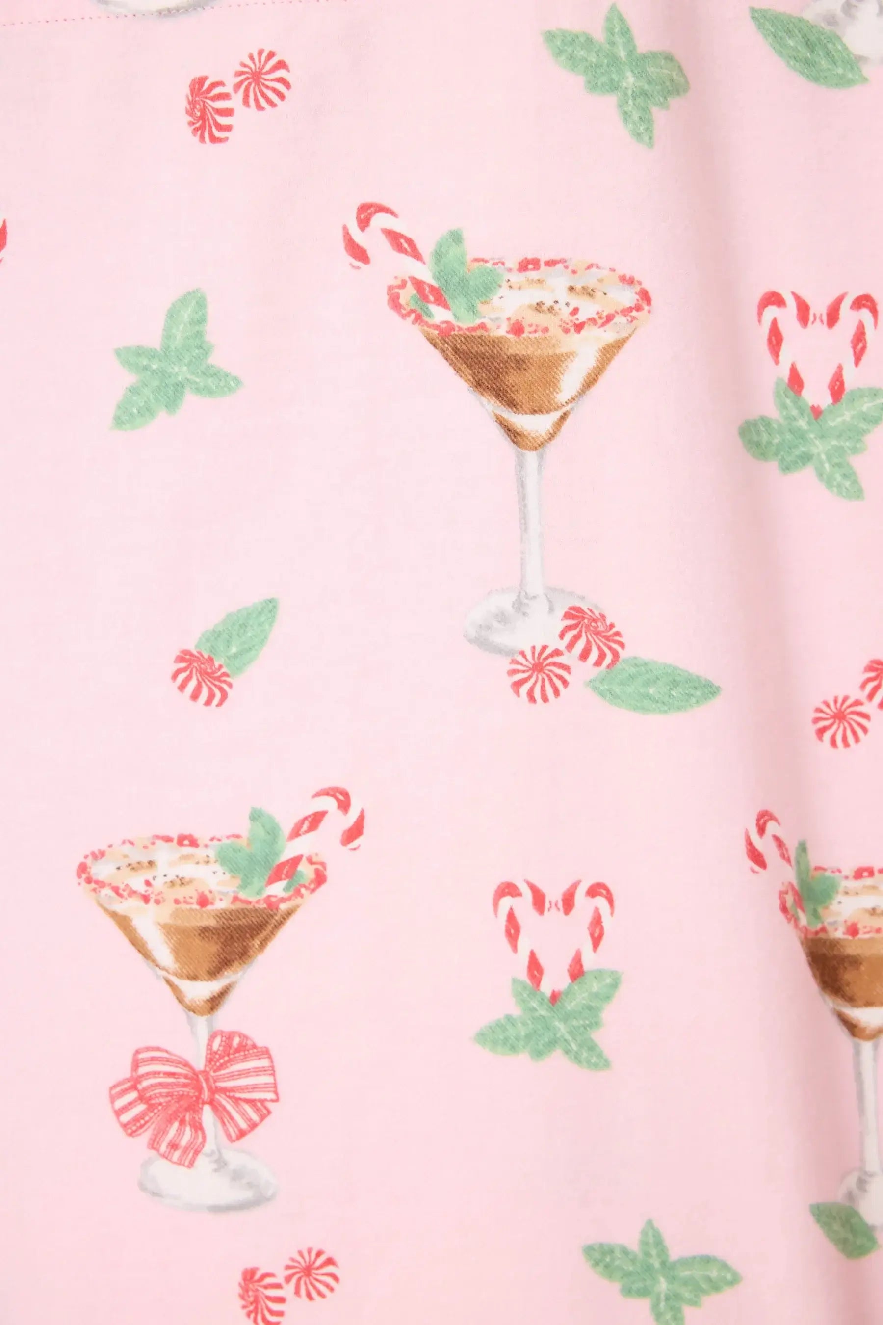 Tini Time drink print feature on a pink flannel fabric, showcasing festive cocktails and candy canes for the PJ Salvage set.